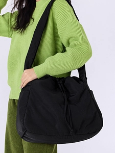 Black large capacity drawstring crossbody bag with wide shoulder strap for women