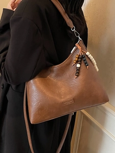 Brown vintage PU leather shoulder bag with colorful wooden bead pendant and fashion logo