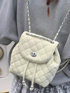 Beige quilted leather backpack with chain straps and pearl drawstring closure for women