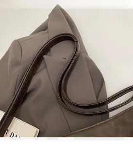 Close-up of the durable flat leather handles with high-quality edge paint finish