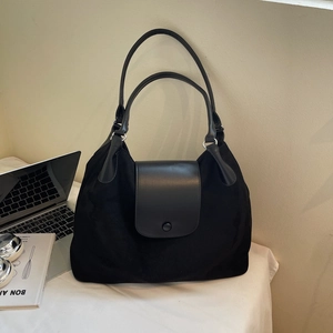 Large black suede tote bag with leather straps and magnetic flap for daily commute