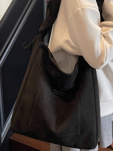 Minimalist black suede bucket bag with large capacity for autumn casual commute