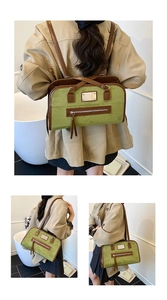 Detail view of retro olive green office tote showing suede texture and brown leather trim