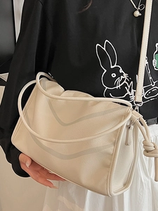 Chic beige textured faux leather crossbody bag with knot detail for women commute