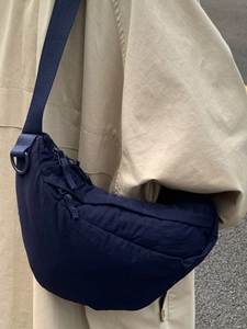 Navy blue nylon crescent crossbody bag with adjustable strap for daily commute wear