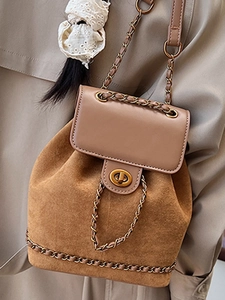 Vintage suede bucket backpack with chain strap and metal twist lock for autumn