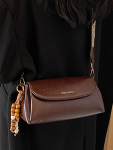 Sac bandoulière rétro marron foncé en similicuir brillant avec sangle tissée ethnique