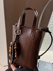 Minimalist dark brown woven leather crossbody mini square bag with wooden bead pendant
