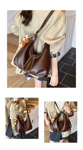 Detail of dark brown tote bag with leather drawstrings and a cute brown teddy bear pendant