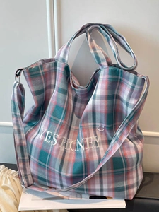 Pink and blue plaid canvas tote bag with YES HONEY embroidery and adjustable crossbody strap