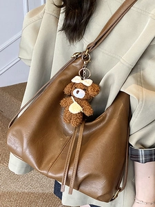 Retro brown oversized hobo tote bag with cute bear charm and adjustable shoulder strap