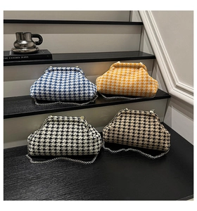 Detailed view of houndstooth shell bags in four colors with gold chain straps
