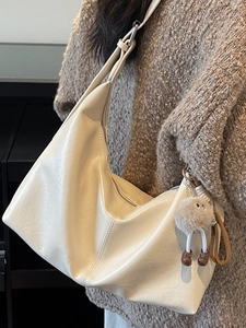 Vintage soft leather large capacity hobo bag in cream white with plush charm