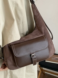 Retro dark brown suede tote bag with leather flap and contrast stitching shown on model
