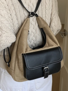 Retro khaki suede hobo bag with black leather flap and white contrast stitching