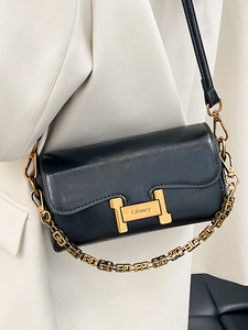 Sac sous le bras chic en cuir noir avec boucle H dorée et bandoulière en chaîne