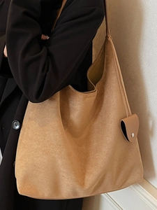 Fashionable khaki suede hobo bag with large capacity and matching pendant charm