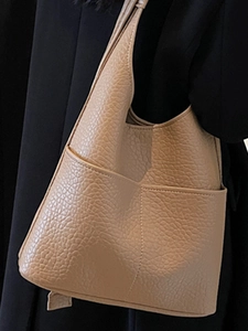 Classic khaki litchi grain leather bucket bag with side pocket for commuting