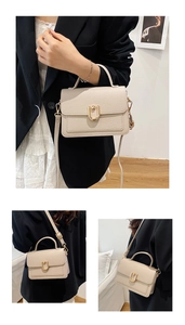 Detailed views of a beige lychee leather handbag with a gold buckle on a model