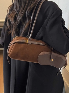 Retro dark brown cylinder shoulder bag in premium suede leather with gold buckle detail
