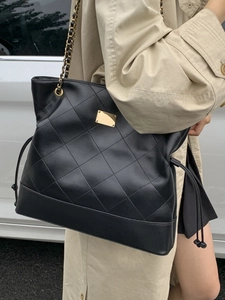 Vintage black quilted leather bucket bag with gold chain strap and large capacity