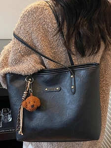 Large black leather tote bag with lychee texture and cute brown teddy bear charm