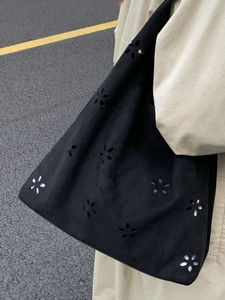 Chic black cutout tote bag for women with laser floral pattern for casual daily commuting