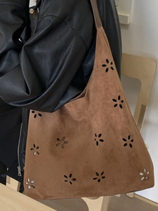 Dark brown suede tote bag with laser-cut floral patterns for office and casual use