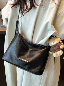 Minimalist black PU leather tote bag with silver metal plaque and cute bear charm