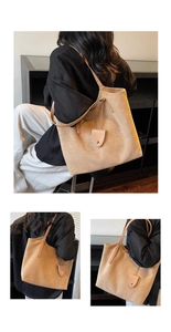 Détail du grand sac cabas en daim camel avec bandoulière réglable et rabat en cuir