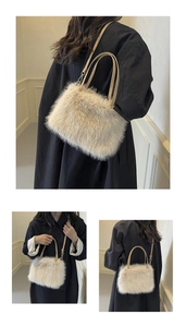 Detail of soft cream faux fur tote bag with adjustable leather strap and golden hardware