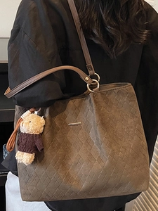 Minimalist large brown quilted leather tote bag for women with cute bear charm