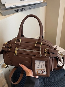Brown Boston handbag in matte PU leather with decorative zippers and a detachable shoulder strap