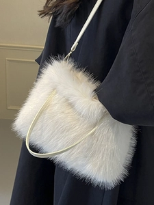 Chic white faux fur shoulder bag for women featuring a minimalist plush design and metal chain