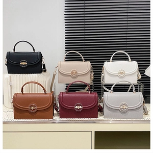 Collection of small crossbody square bags in six colors with metallic round turn-lock