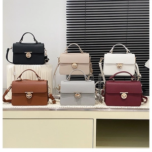 Litchi texture leather handbags with golden rotary locks in six various elegant colors