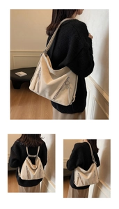 Detail of beige versatile leather backpack with star zipper charms and side pockets