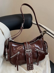 Retro glossy leather shoulder bag in dark brown with silver buckles and hardware details