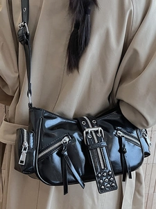 Retro black glossy motorcycle shoulder bag with silver studs and zipper details