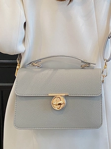 Gray lychee textured leather square handbag with golden ring lock and top handle