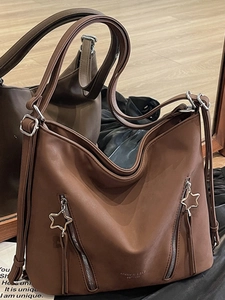 Caramel brown large capacity tote bag with star zipper details and matte finish