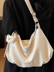 Off-white large cloud shoulder bag with silver chain and cute teddy bear charm