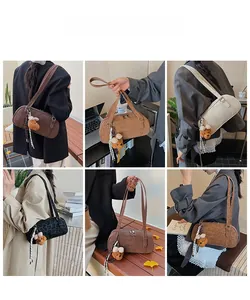 Chic leopard print cylinder shoulder bags shown in various colors with cute bear charms