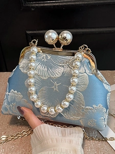 Elegant light blue vintage handbag with floral embroidery and pearl clasp handle