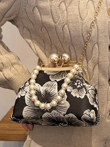 Elegant Chinese style black floral embroidery handbag with pearl handle and metal kiss-lock