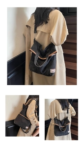 Detailed close-up of retro denim tote bag with leather trim and stylish logo label