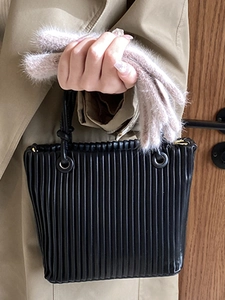 French retro pleated bucket bag in black with premium beige faux fur winter gloves