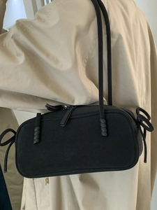 Retro black matte Boston bag with bow detail and slim shoulder straps for daily wear