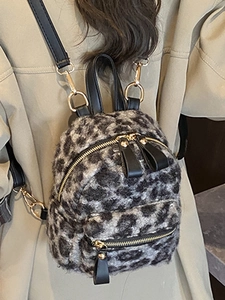 Mini leopard print plush backpack for women with golden zippers and black leather straps