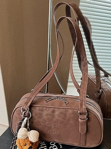 Vintage brown suede underarm shoulder bag with teddy bear charm and dual zipper